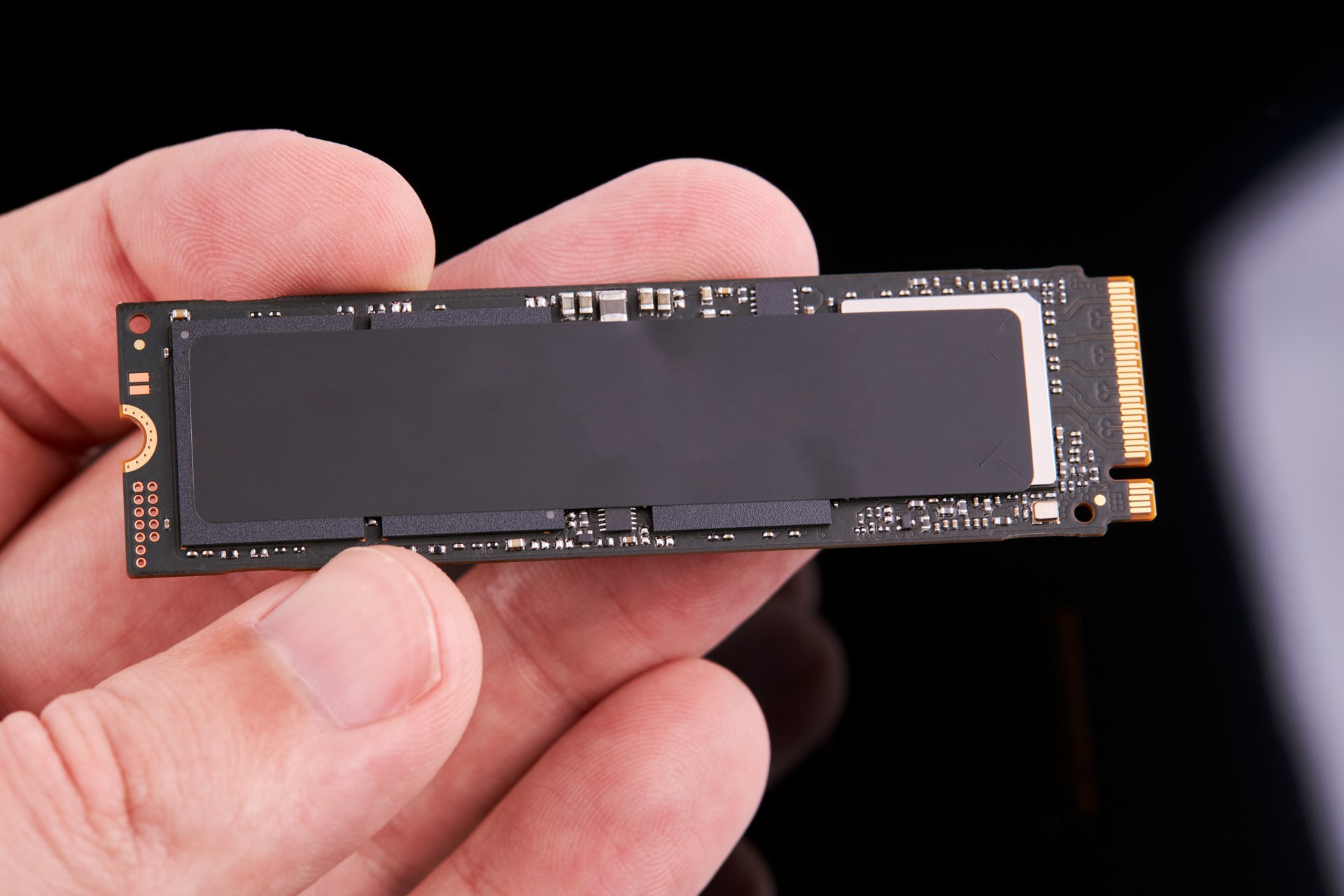 Hand holding a solid-state storage module