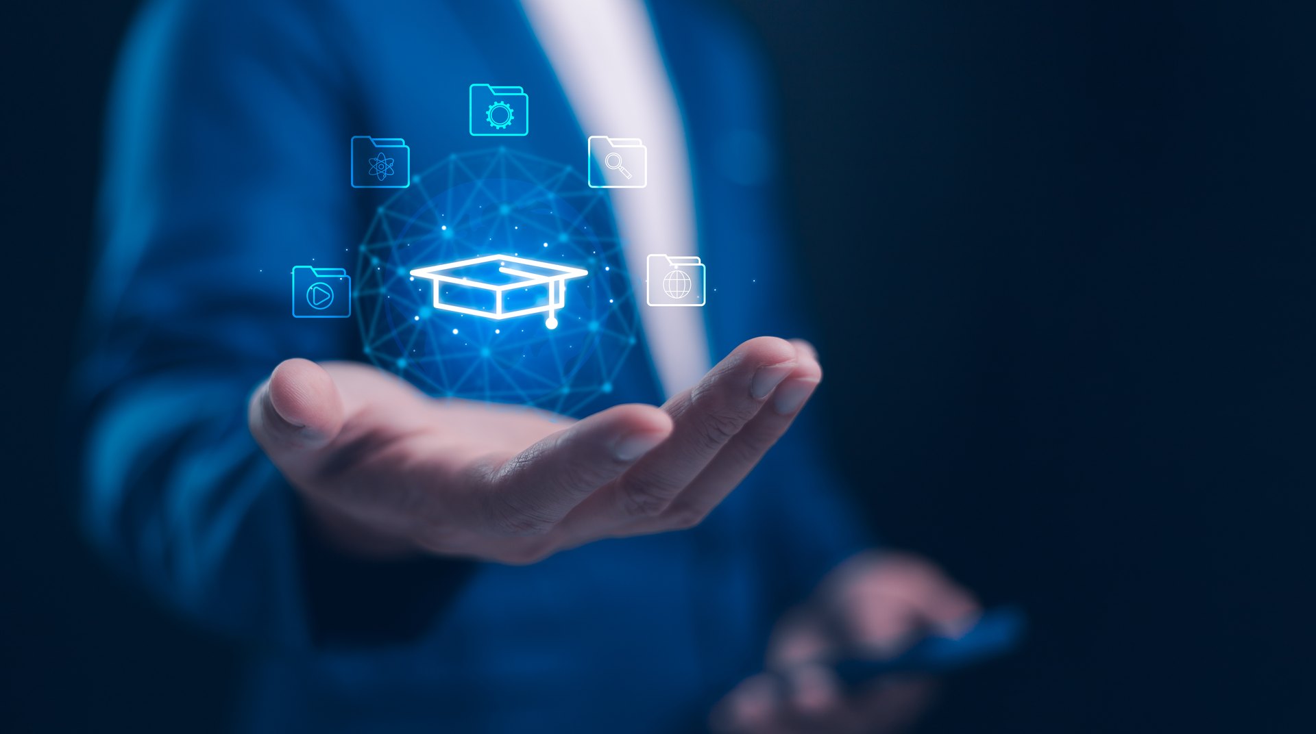 Conceptual illustration of online learning and a graduation cap